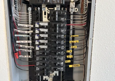 Residential breaker panel with neatly routed wiring