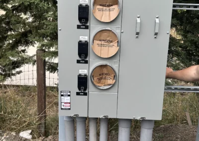 Multi-meter bank with conduit risers on a new build