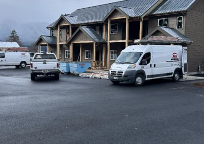 Work van parked at a new townhome construction site